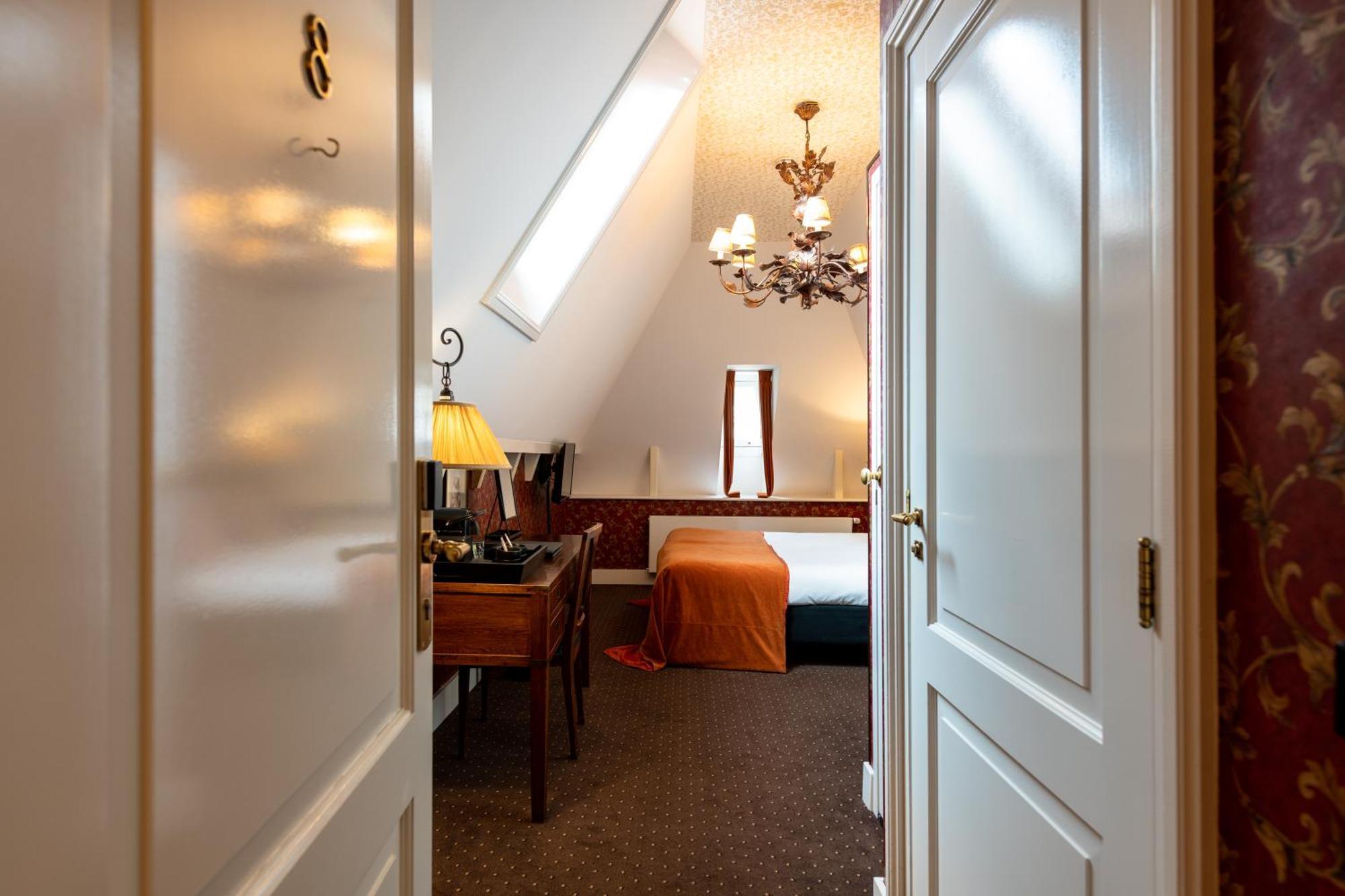 Grand Boutique Hotel-Restaurant Huis Vermeer Девентер Номер фото